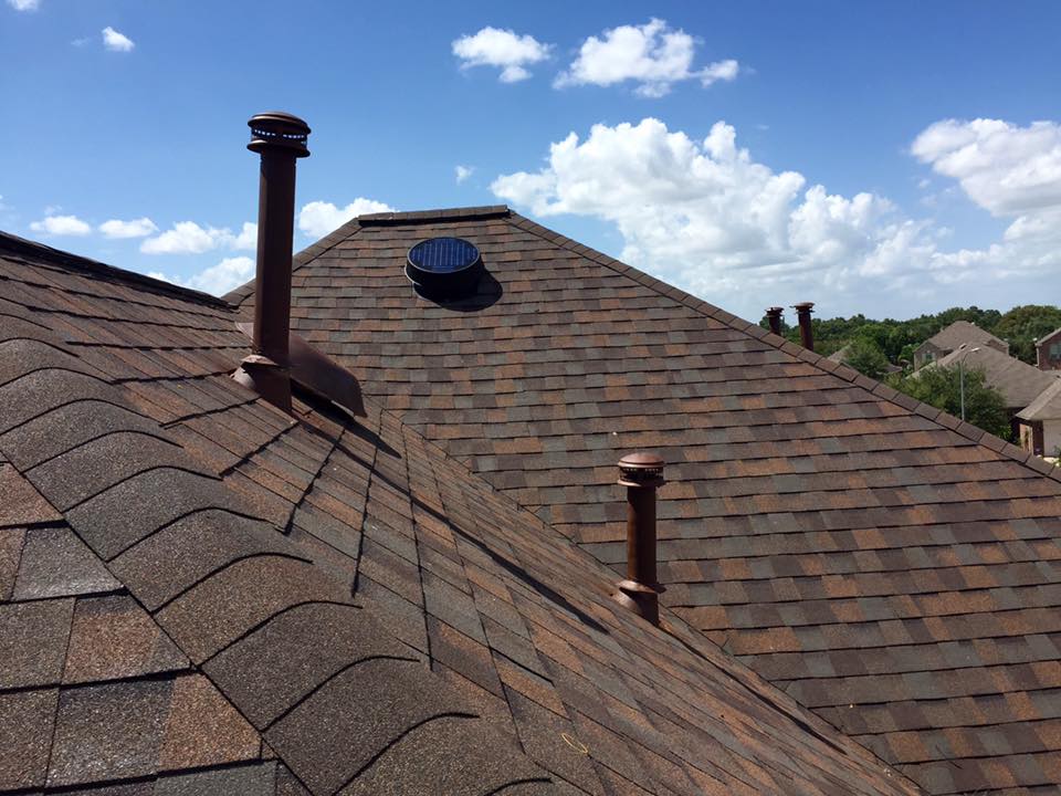 Stallion Roofing & Solar Solutions Roofing job - closeup of brown asphalt roof